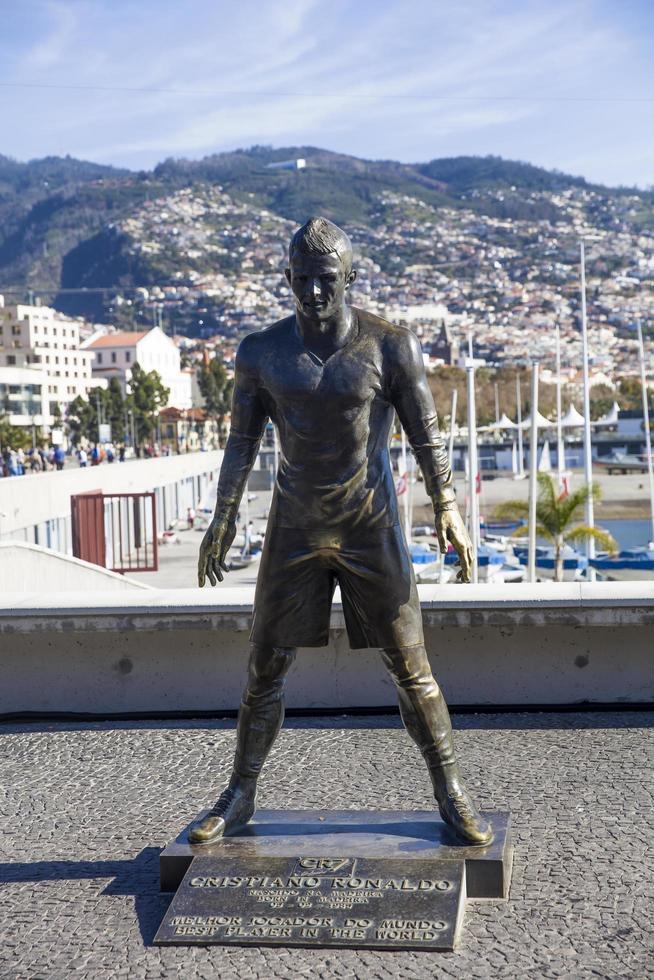 FUNCHAL, PORTUGAL, FEBRUARY 9, 2020, Christiano Ronaldo Statue in Funchal at Madeira Island, Portugal. Statue of famous Madeiran football player was created by sculptor Ricardo Velosa in 2014. photo