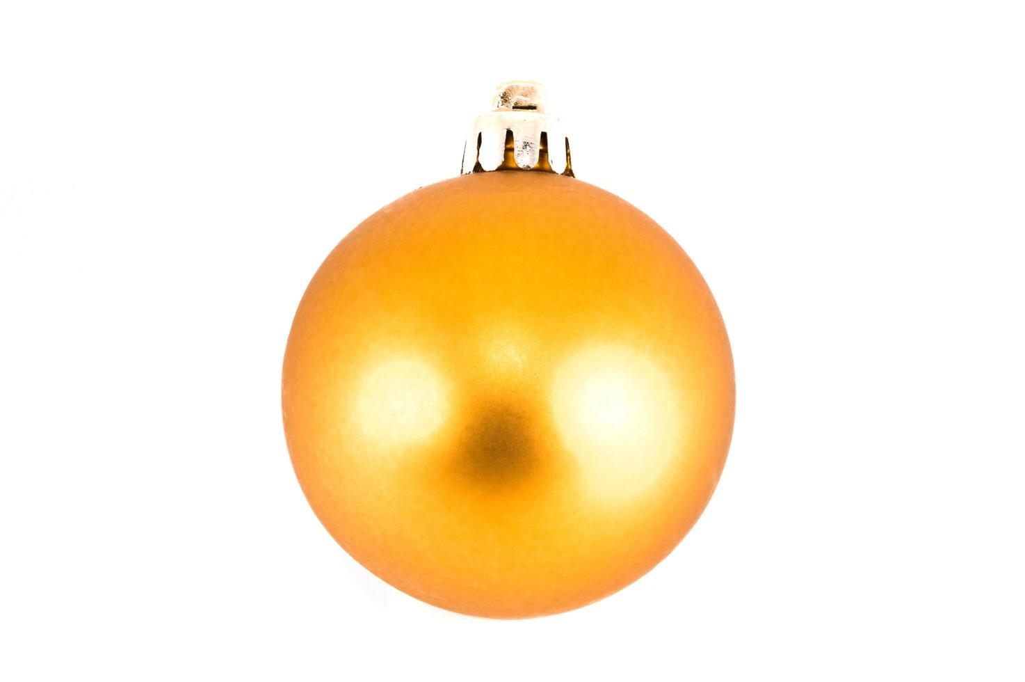 Yellow Christmas ball isolated on white background photo