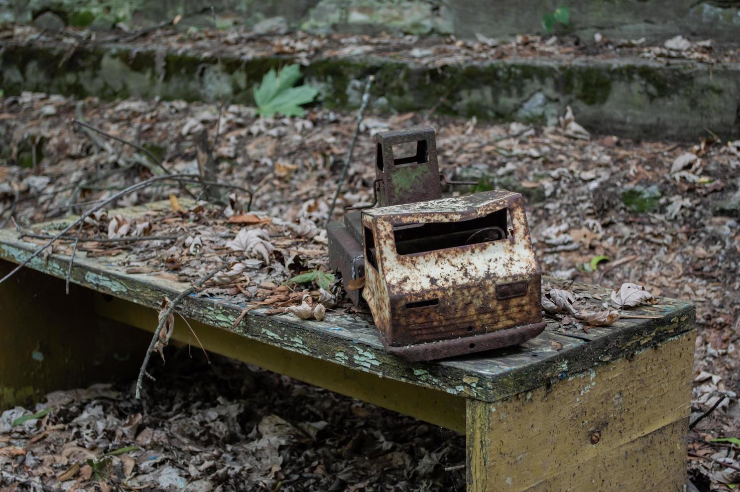 A radioactive old toy in an abandoned kindergarten in the city of pripyat photo