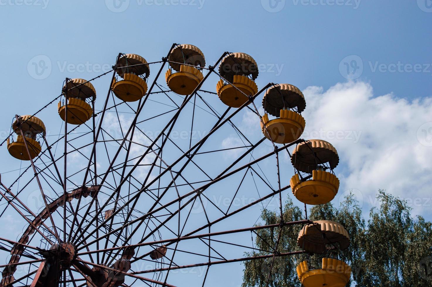 Abandoned metal radioactive attraction in an amusement park in the city of Pripyat photo