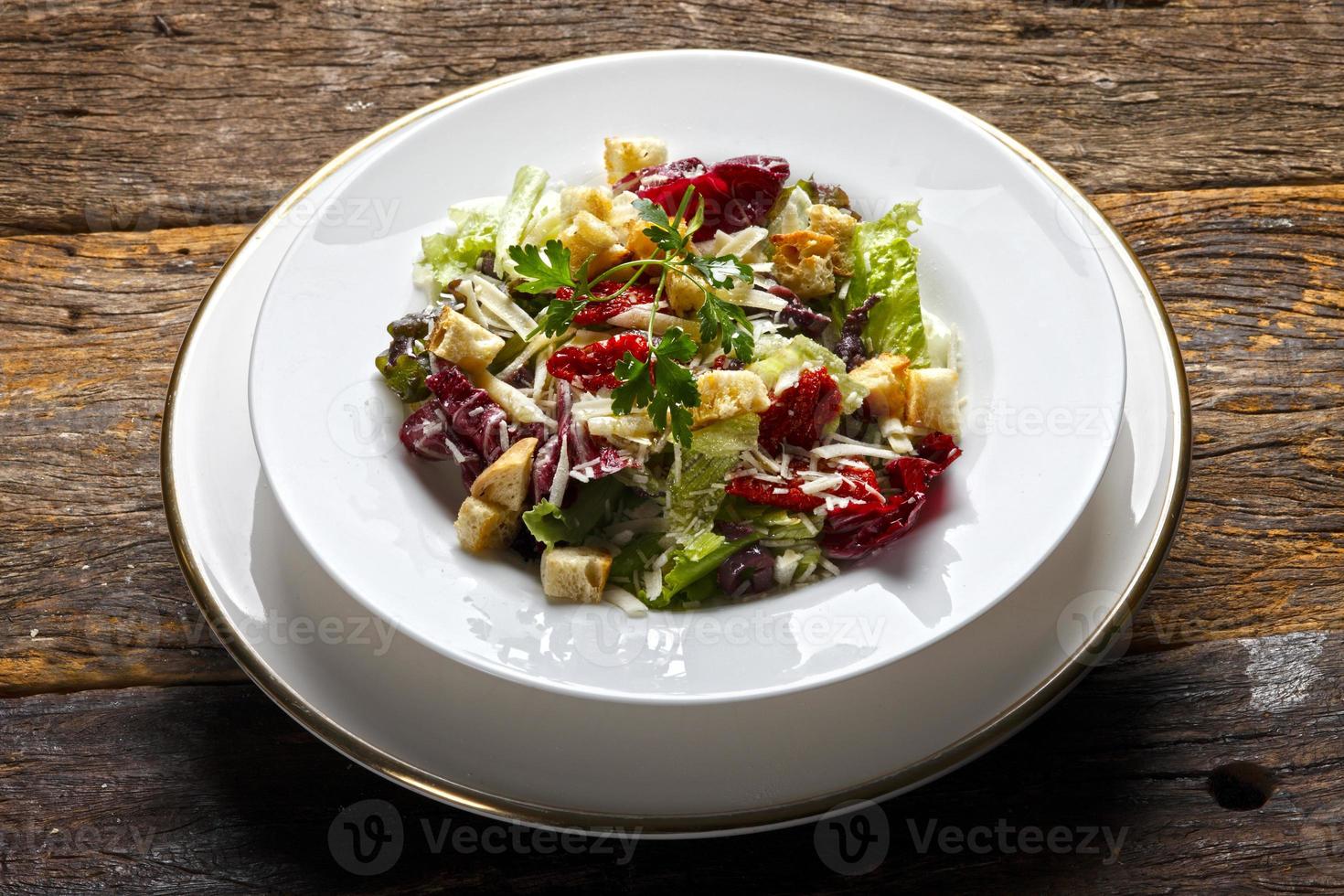 Dry tomato salad, bread and red wine photo