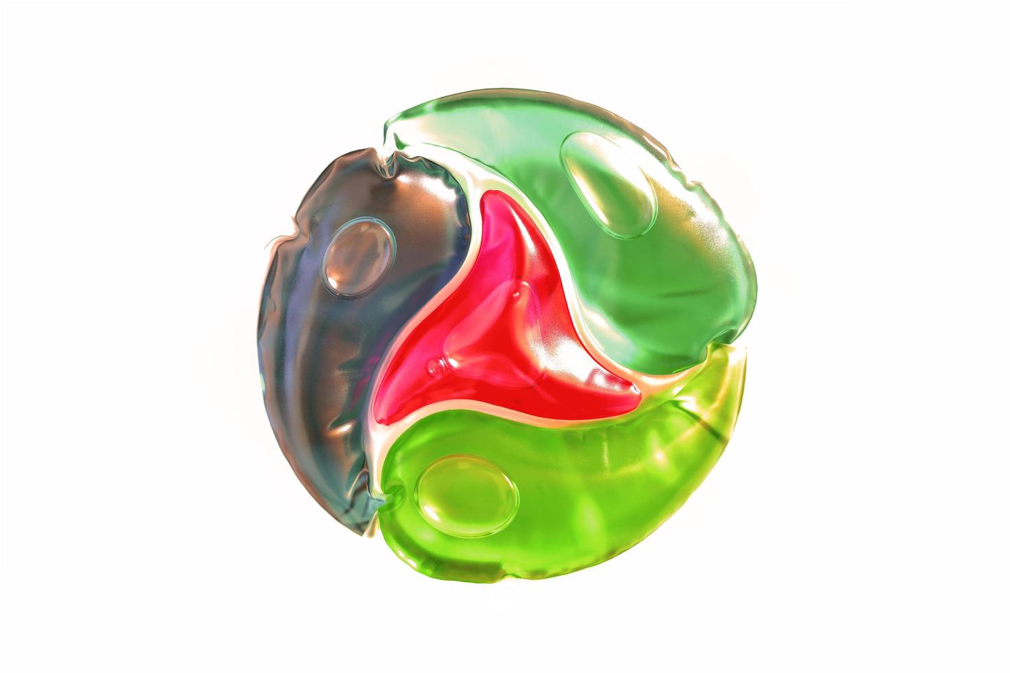 Extreme macro photography of laundry pod on white background. Liquid colored detergent photo