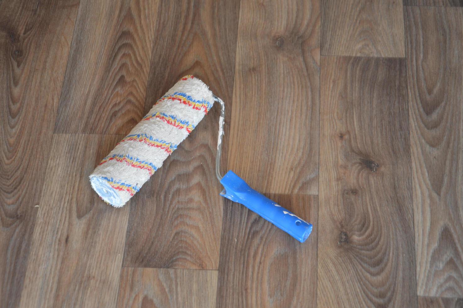 Laying industrial linoleum in the interior of the house photo