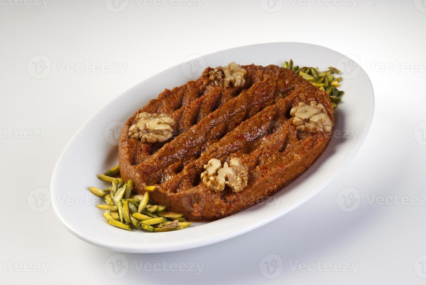Plate of mutable on white background photo