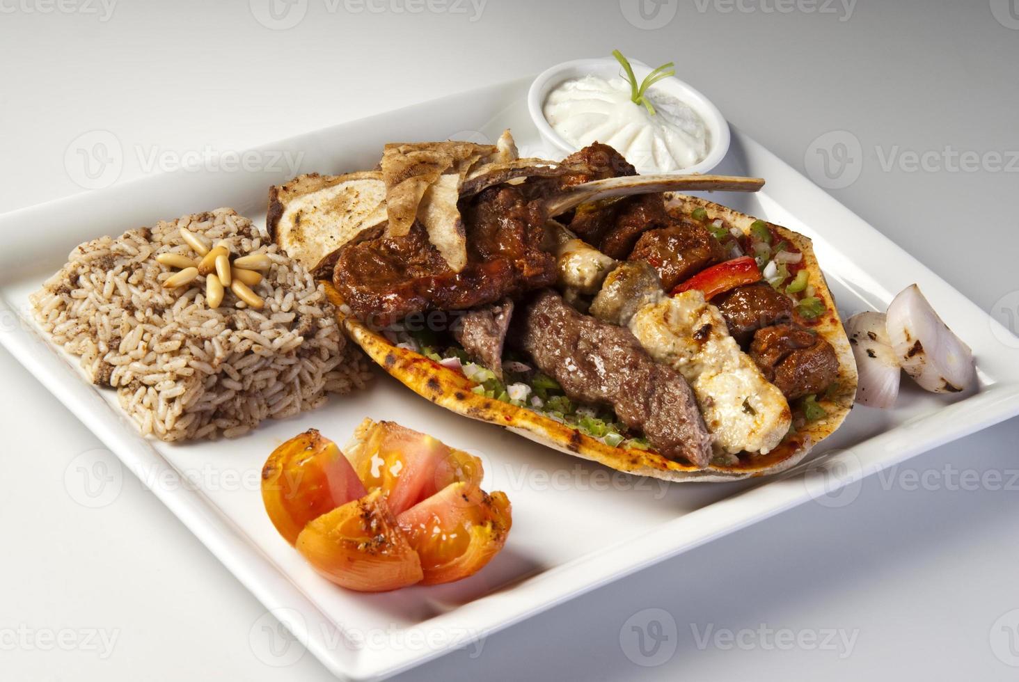 Traditional Arabic mixed barbeque plate. photo