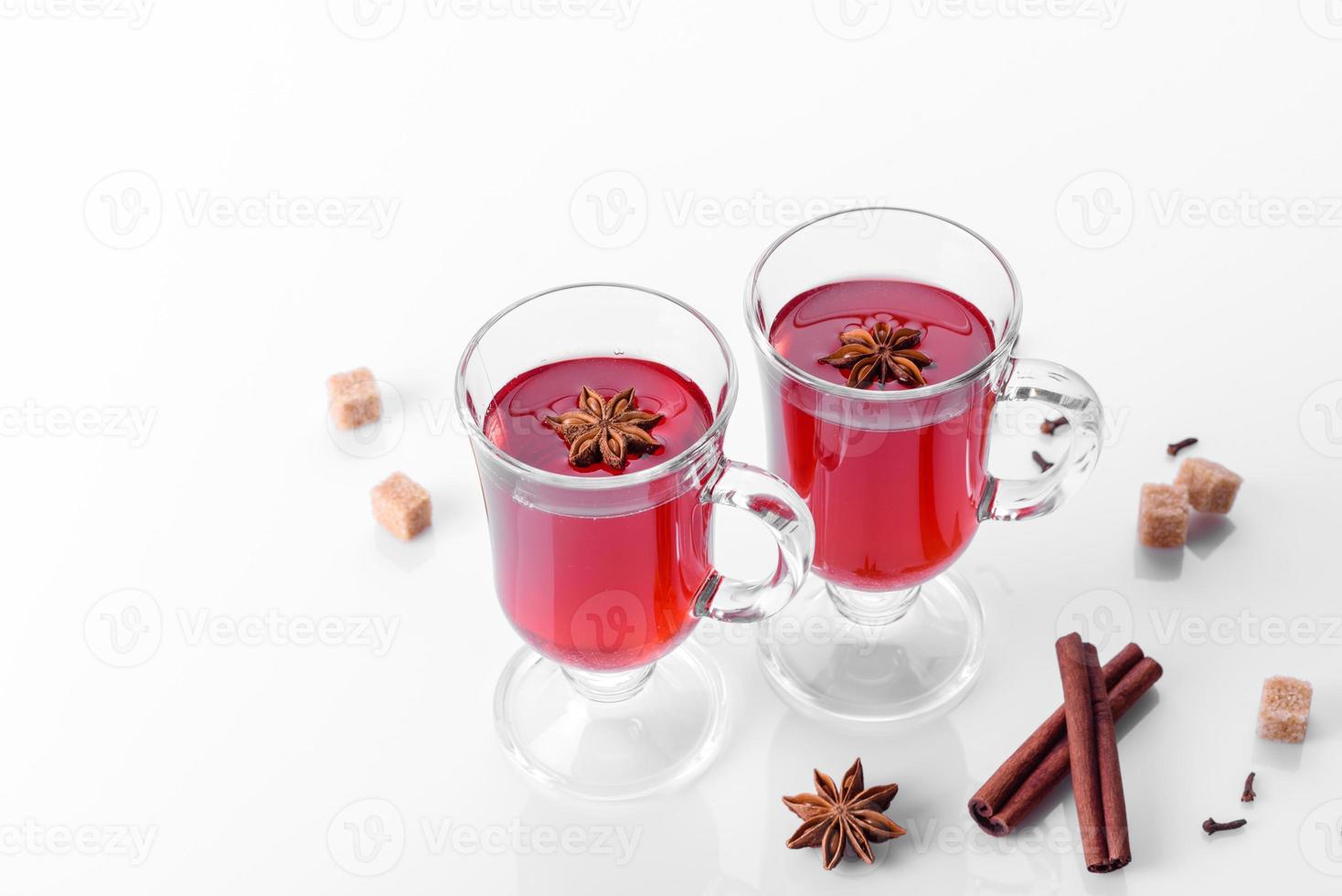 Hot red mulled wine isolated on white background photo