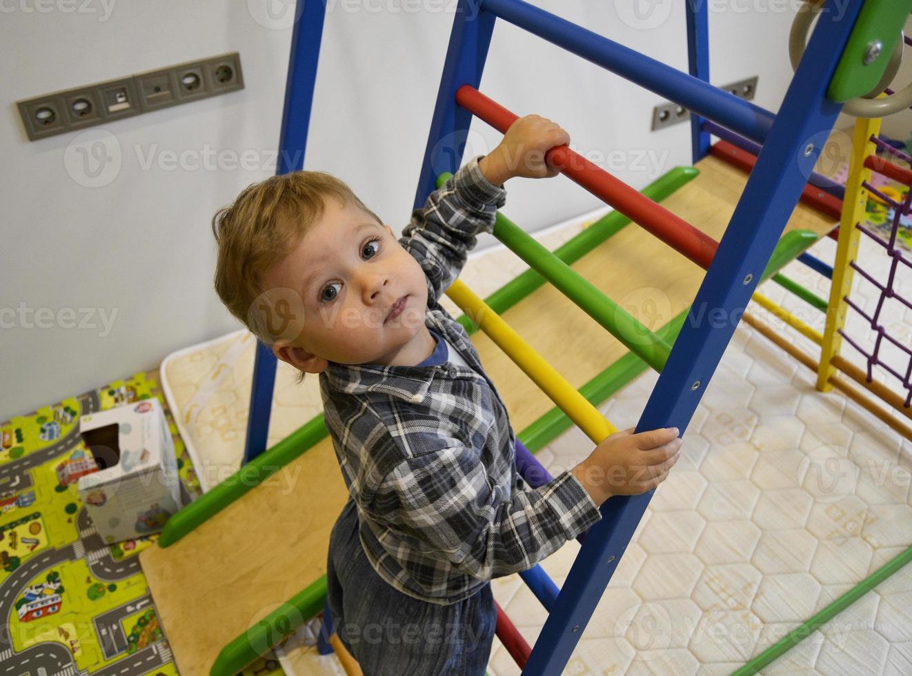 Beautiful baby boy with child face posing photographer photo