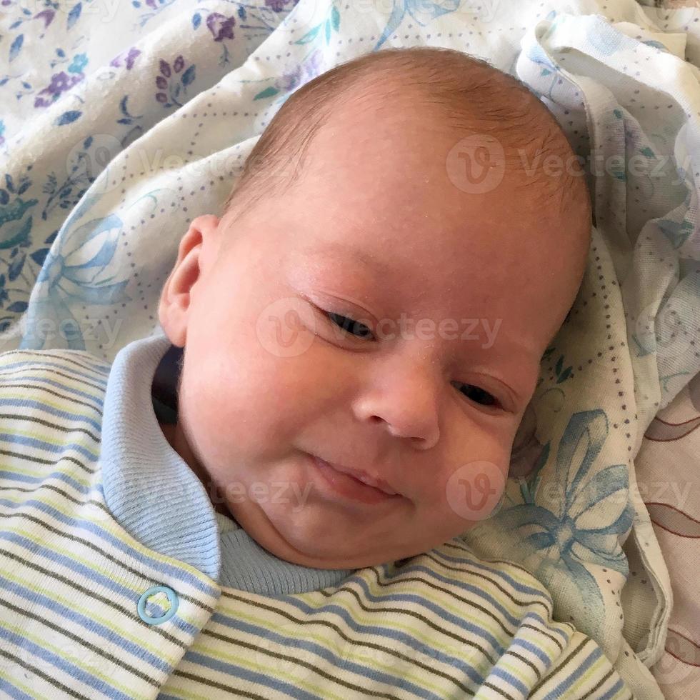 Beautiful baby boy with child face posing photographer photo