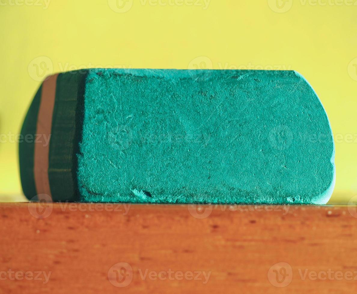 green pencil rubber with copy space photo