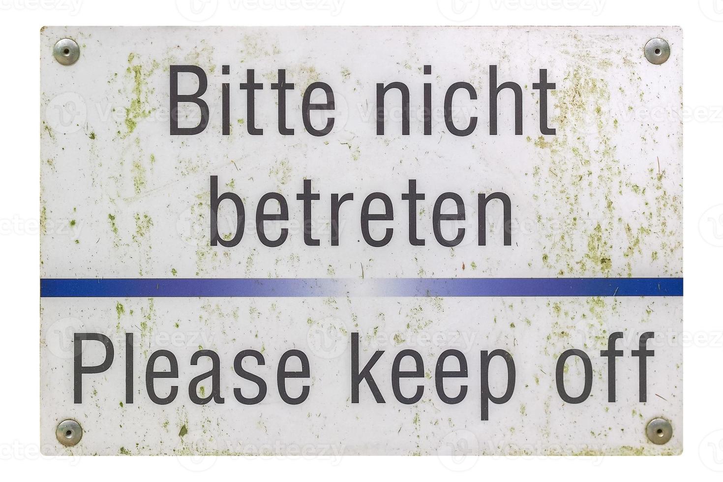 signo alemán aislado sobre blanco. por favor manténgase alejado. foto