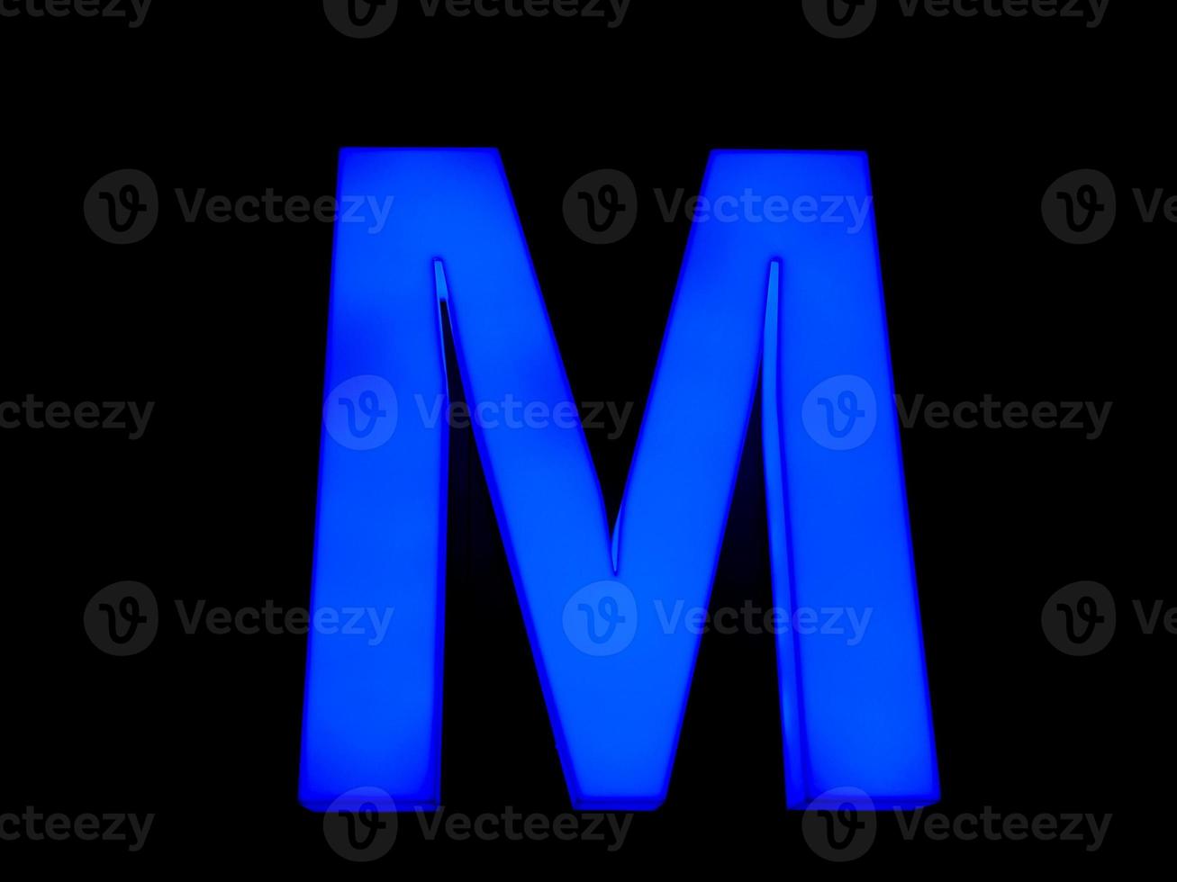 blue neon letter M photo