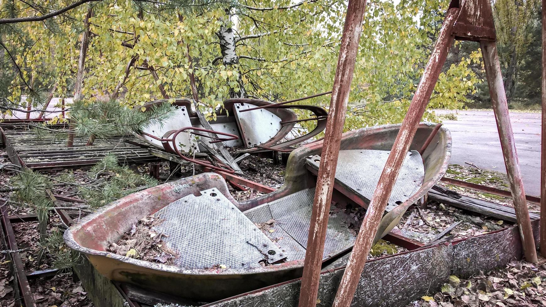 Pripyat, Ukraine, 2021 - Old amusement park rides in Chernobyl photo