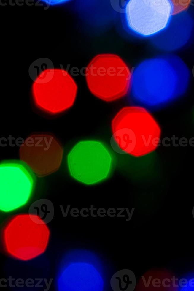 Colorful bokeh on black background photo