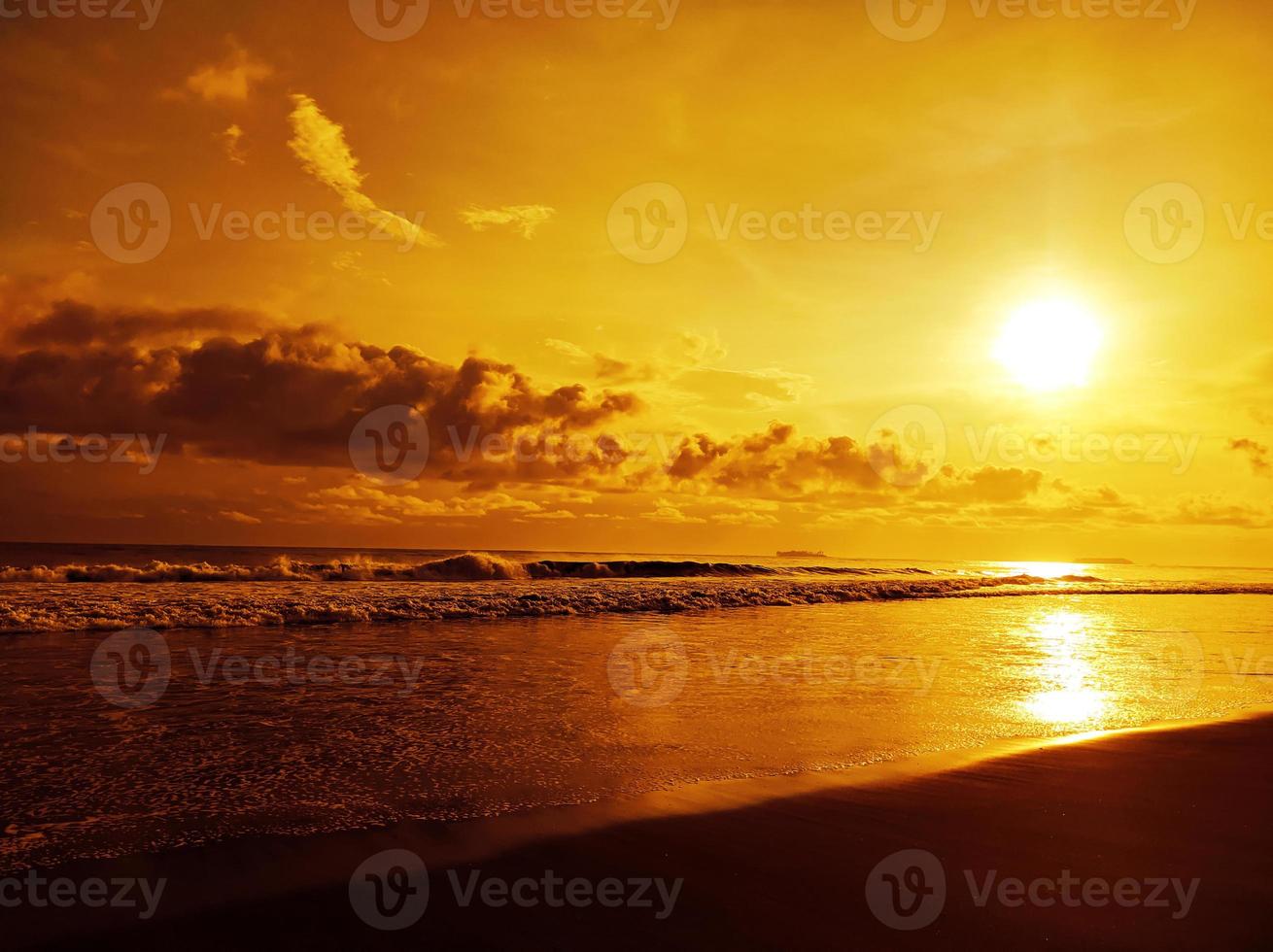 Golden sunset in the beach photo