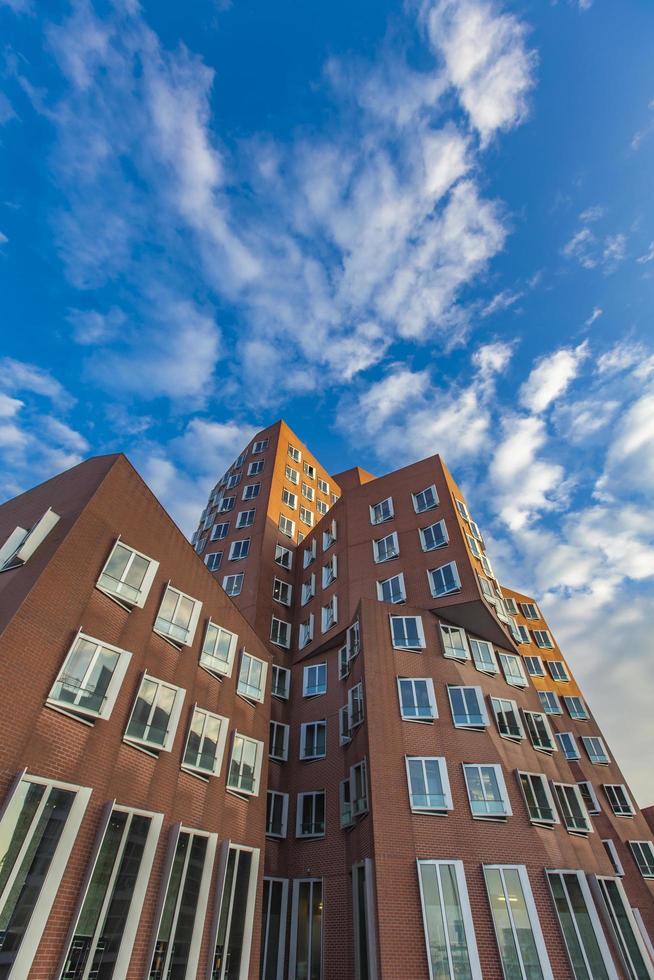 DUSSELDORF, GERMANY, NOVEMBER 8, 2011 - Gehry buildings in Duesseldord, Germany. The Gehry Buildings in Dusseldorf Harbor are  wonderful representatives of postmodern architecture. photo