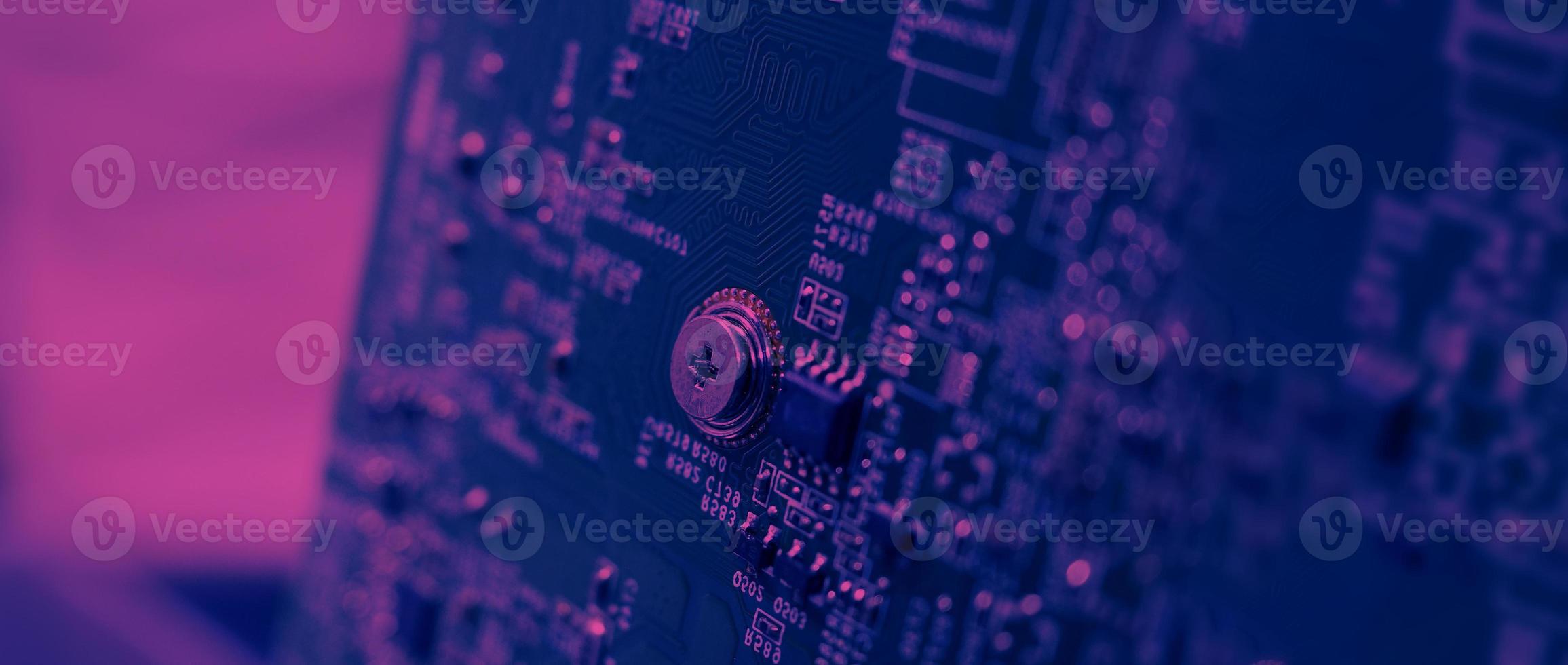 Semiconductor. cpu chip located on the green motherboard of the computer. photo