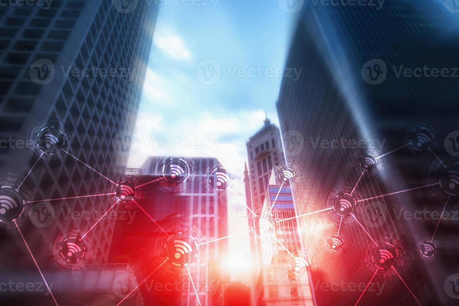 Wi-fi icon on the modern city of the future. Wireless network connection. Hong Kong abstract image. photo