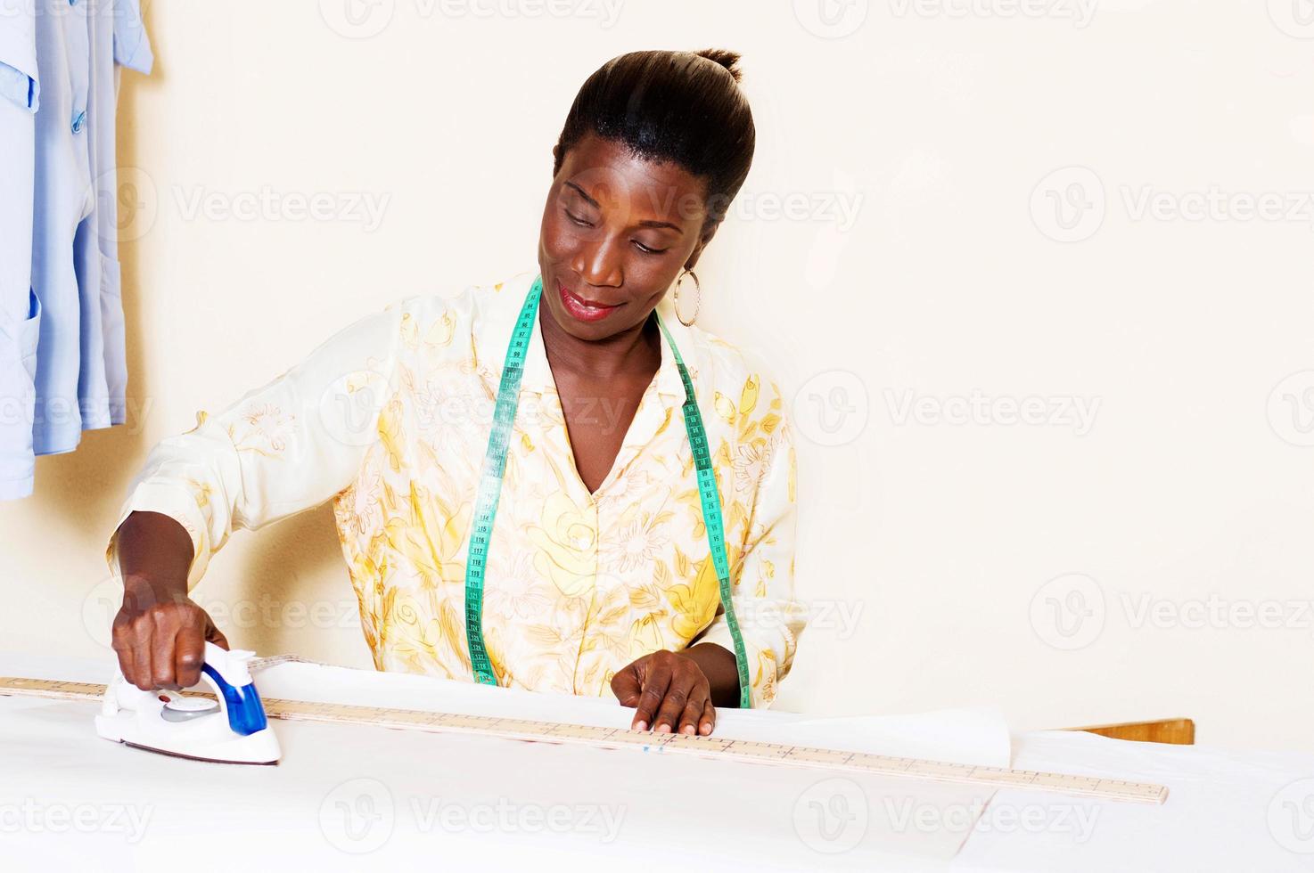 Seamstress in her studio. photo