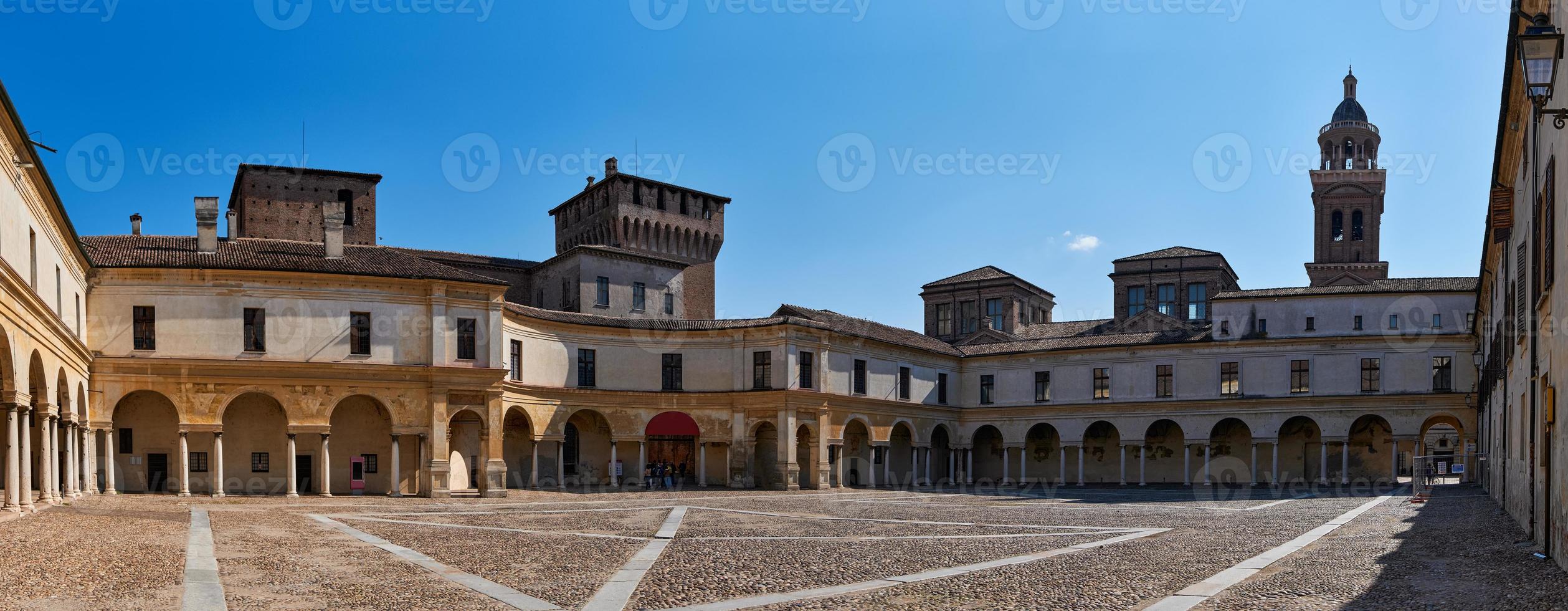 Panoramic view of a medieval square and entrance to the palace photo