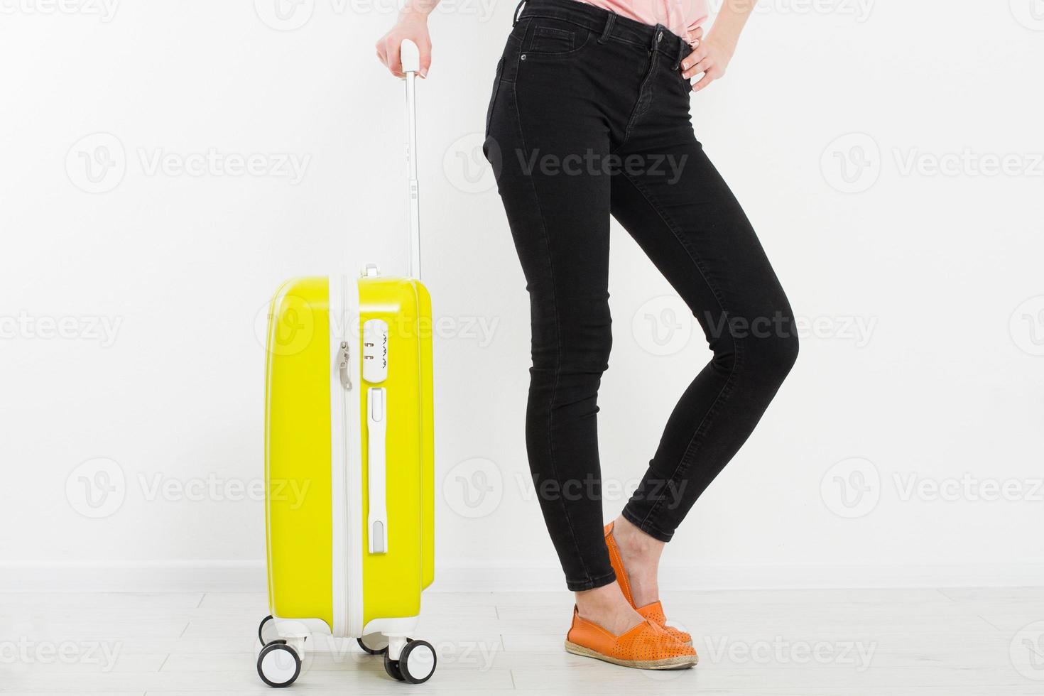 girl with yellow suitcase isolated on white background .Summer holidays. Travel valise or bag. Mock up. Copy space. Template. Blank. photo