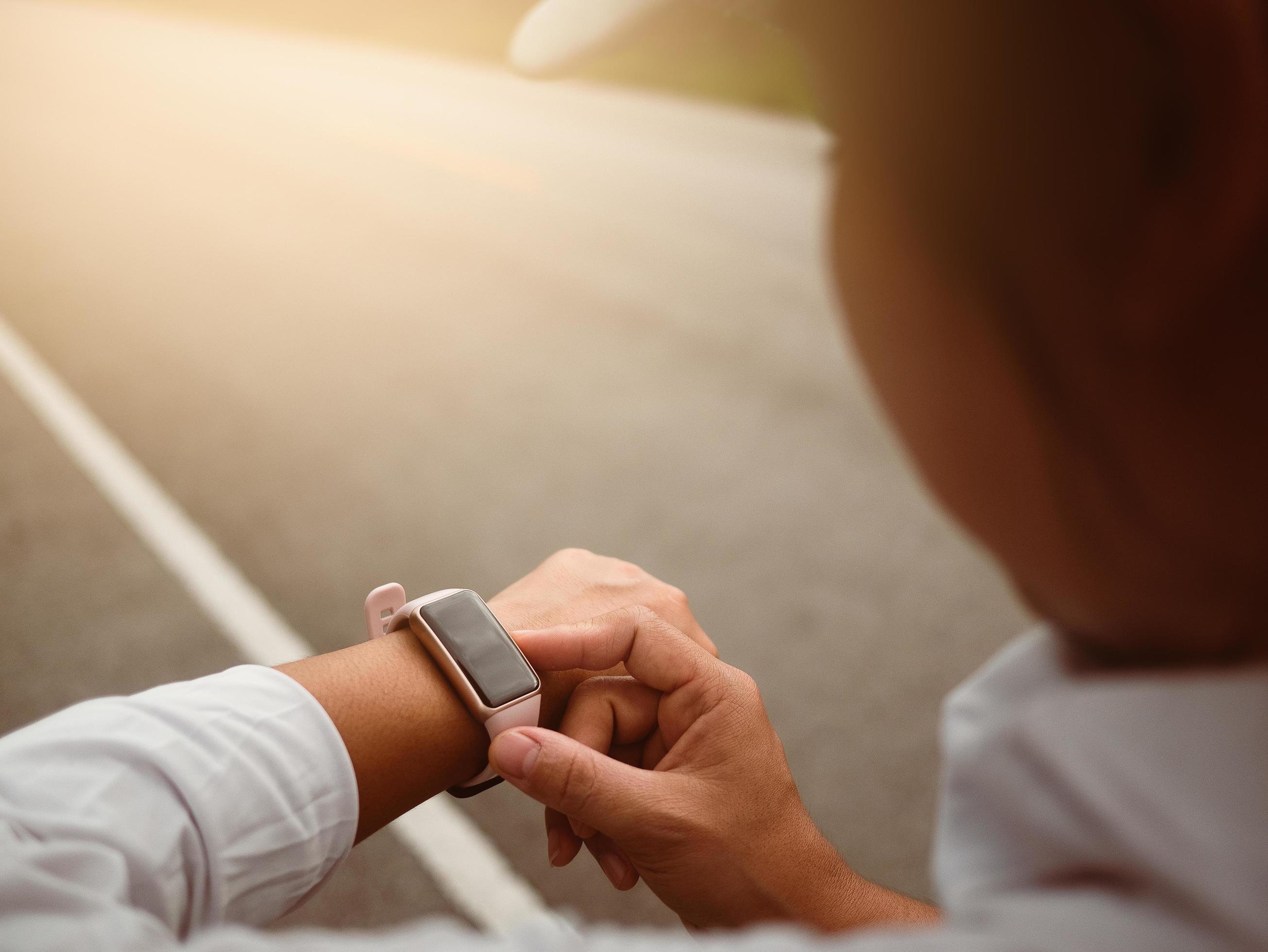Female runners looking at smart watch heart rate monitor. Athlete running exercising outdoors and checking progress on smart watch. Healthy lifestyle concept. 3735726 Stock Photo at Vecteezy