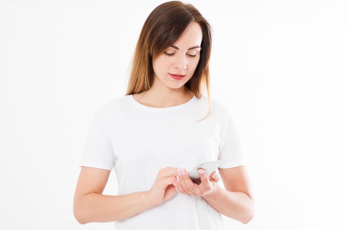 Charming joyful girl is reading pleasant text message on mobile phone from her boyfriend during her rest time, modern businesswoman is received positive feedback from customers on cell telephone photo