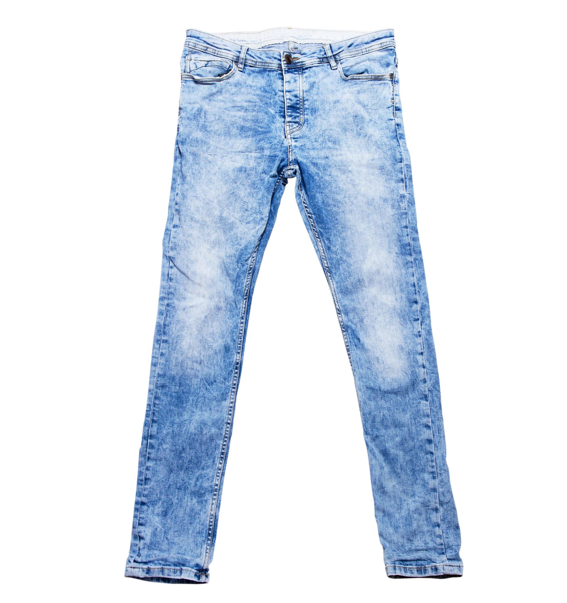 Blue denim pants on white close up copy space, blue jeans background ...