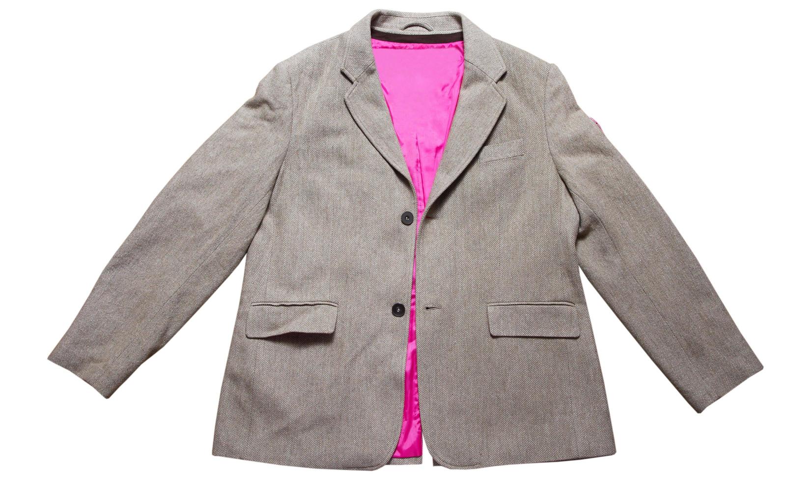 Men's classic blazer with pink lining on a white background - isolated photo