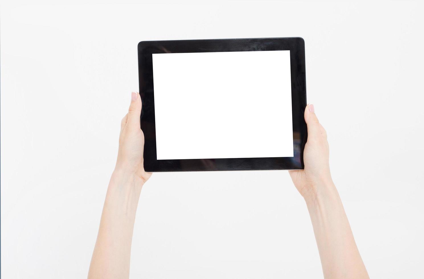 Hand holding black tablet isolated on white clipping path inside. Top view.Mock up.Copy space.Template.Blank. photo