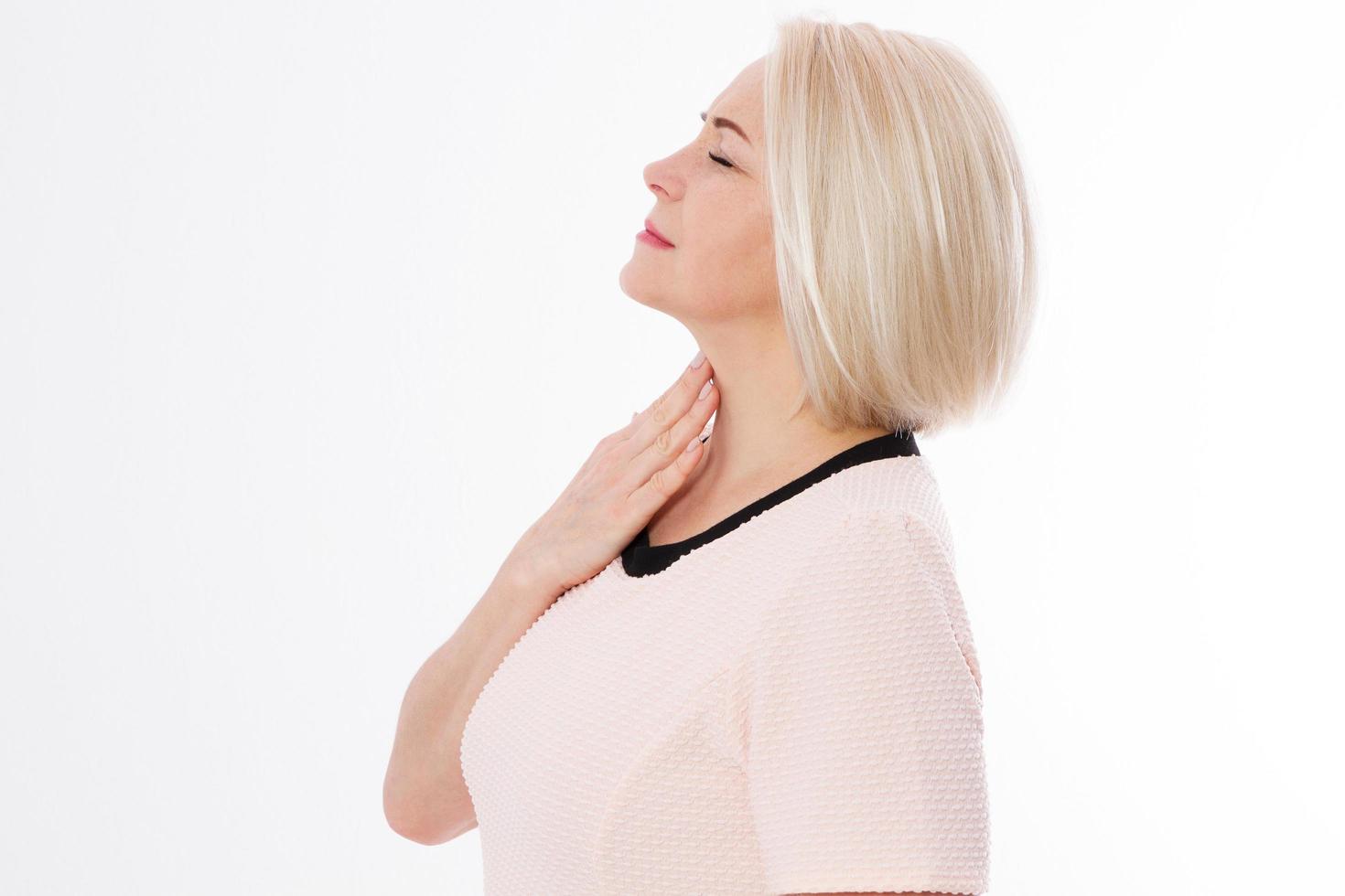 Sore throat woman, middle age woman suffer sore throat pain and touching her heck, female cold photo
