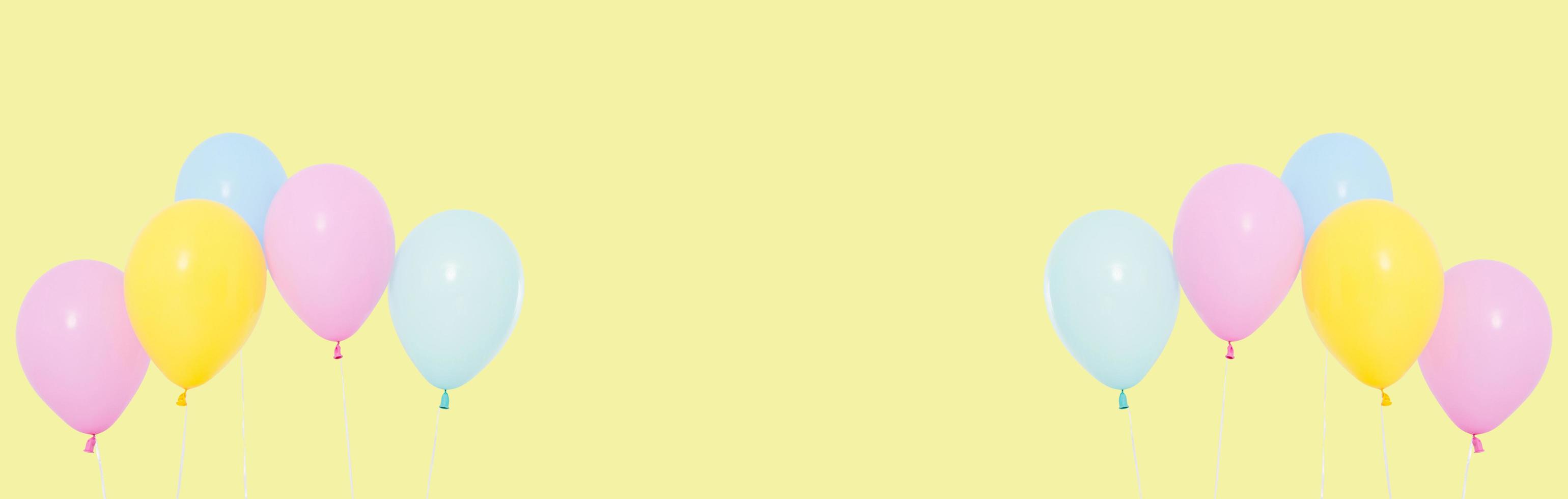 set of colorfull ballons isolated on yellow background, holidays concept, new year, copy space photo