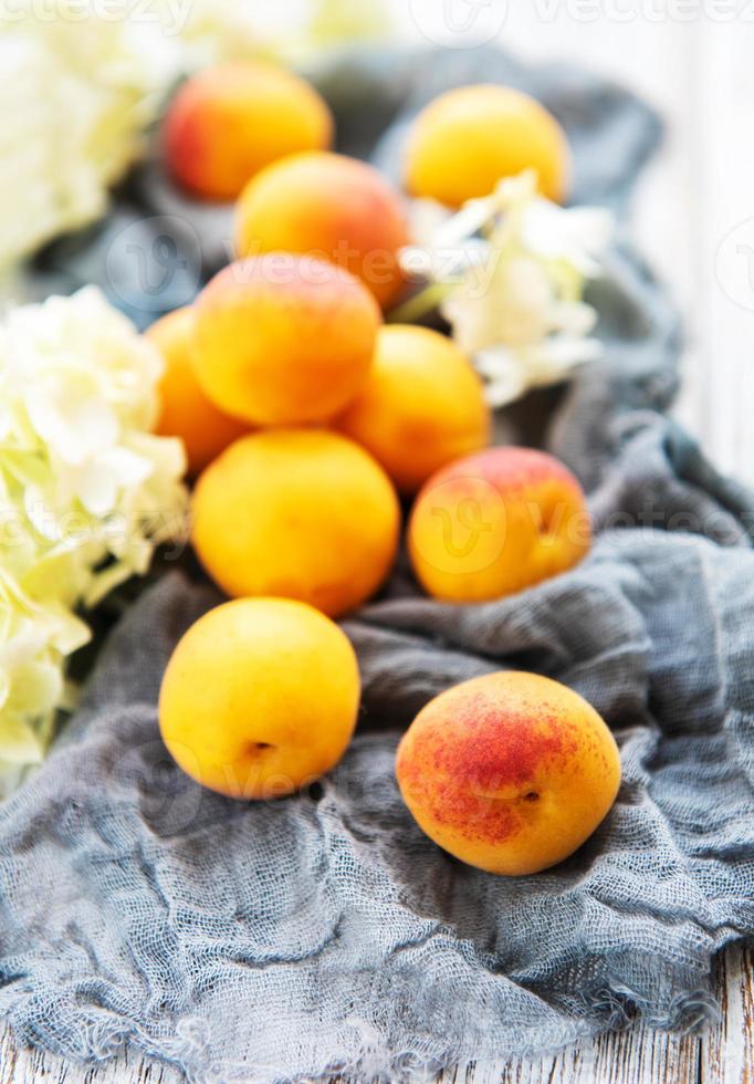 Fresh apricots on a table photo