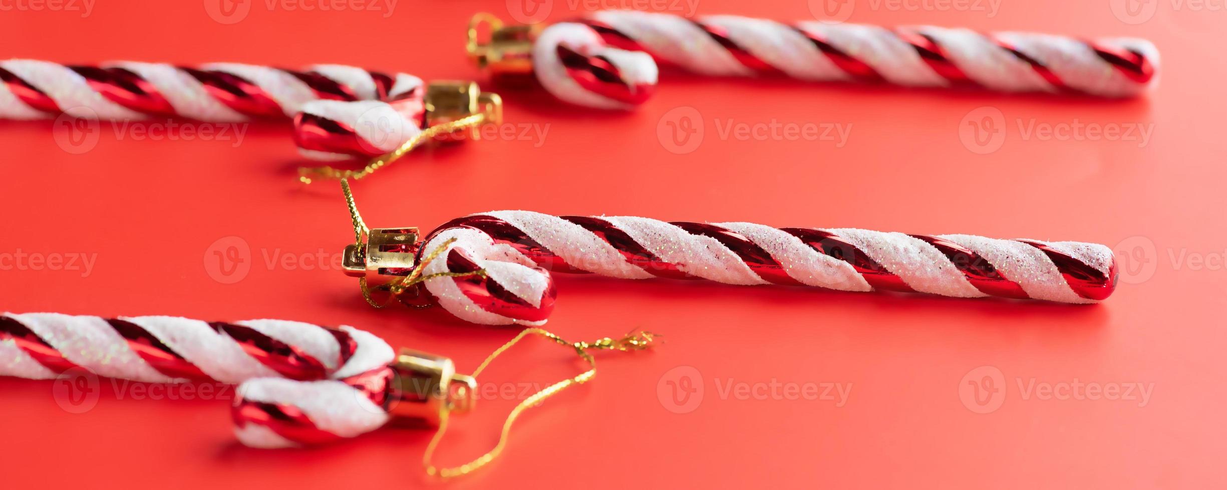 Christmas composition of toys on Christmas tree New Year's ornament on a colored background. photo