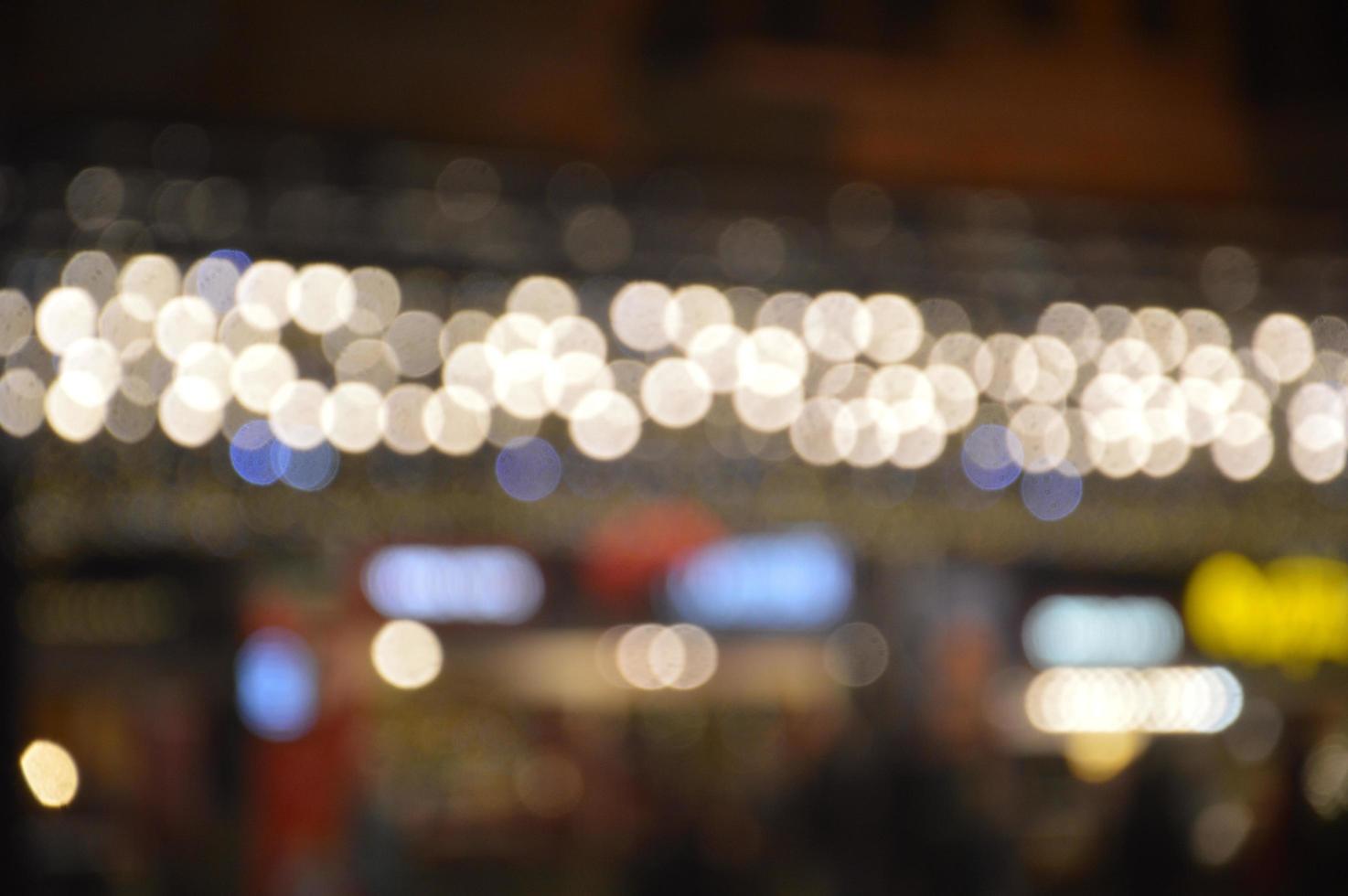 New Year's blurry garlands glow at night in composition photo