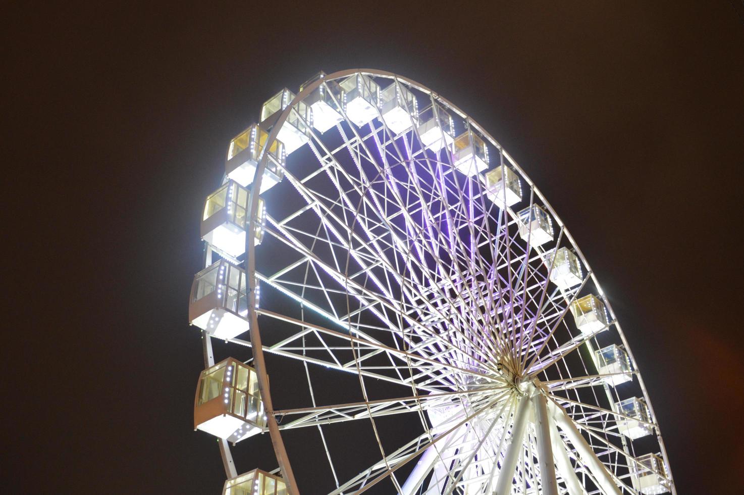 Illuminated New Year's ferris wheel photo