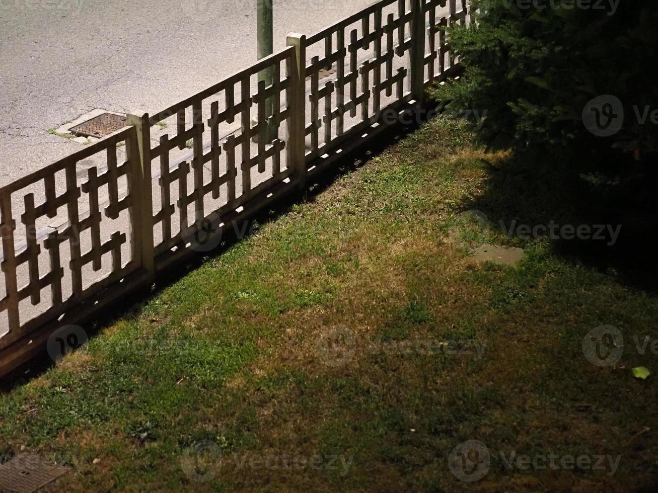 fence between road and lawn photo