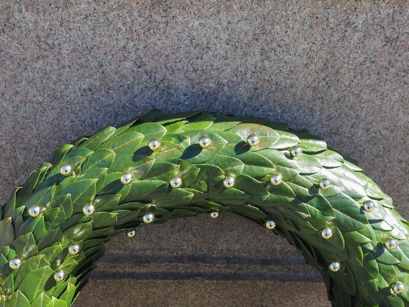 laurel wreath over stone photo