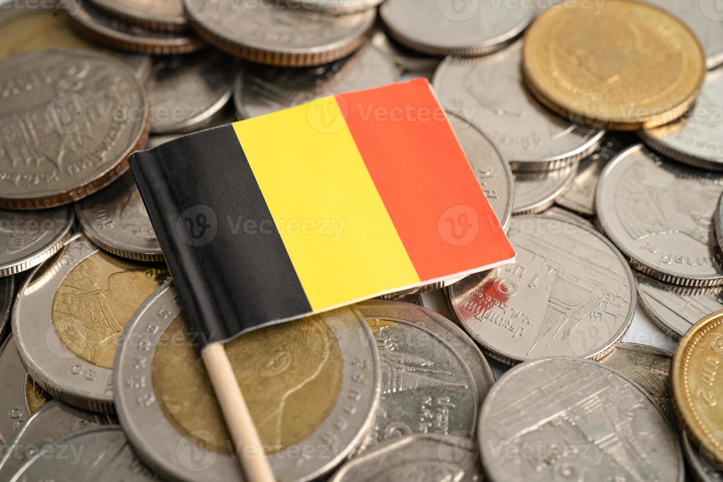 Stack of coins with germany flag on white background. flag on white background. photo
