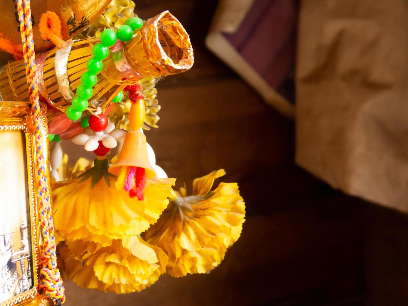 close-up of the offerings or hanging mobiles that are a hallmark of the Buddhist day festival photo