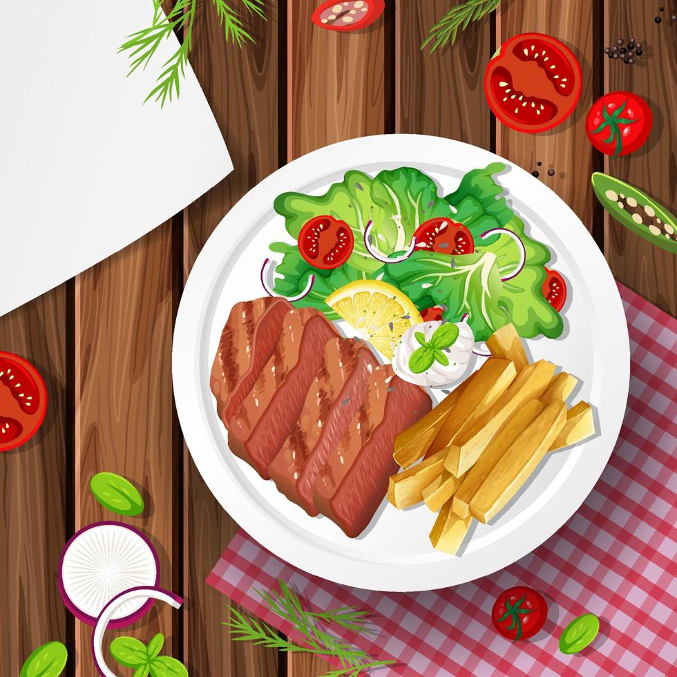 Steak with vegetables on the table vector