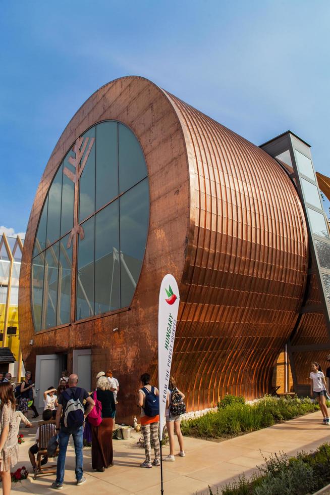 MILAN, ITALY, JUNE 1, 2015 - Unidentified people by the Hungarian Pavilion at EXPO 2015 in Milan, Italy. EXPO 2015 took place from 1 May to 31 October 2015. photo