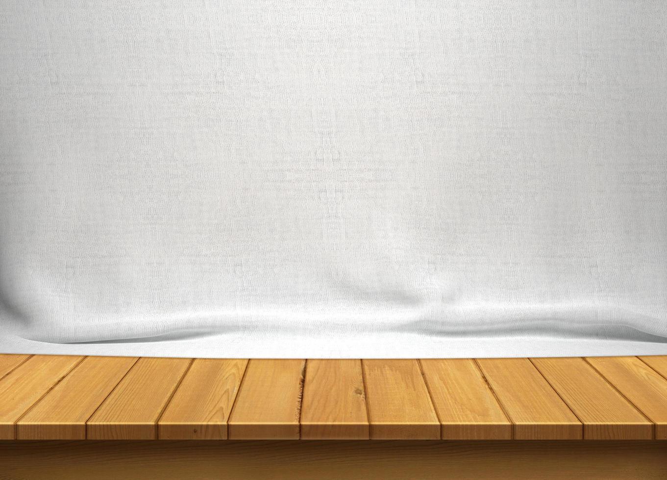 Mesa de madera con fondo de tela de algodón blanco foto