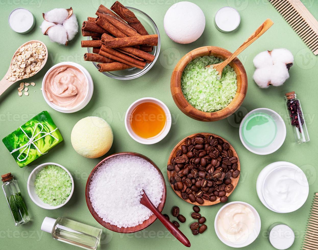 Natural cosmetics and spa ingredients top view on green photo