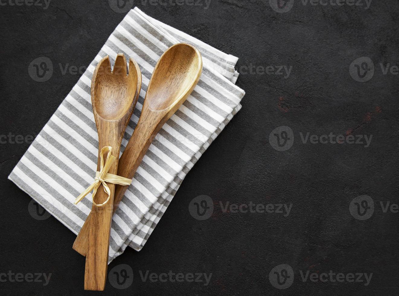 Two wooden salad spoons photo