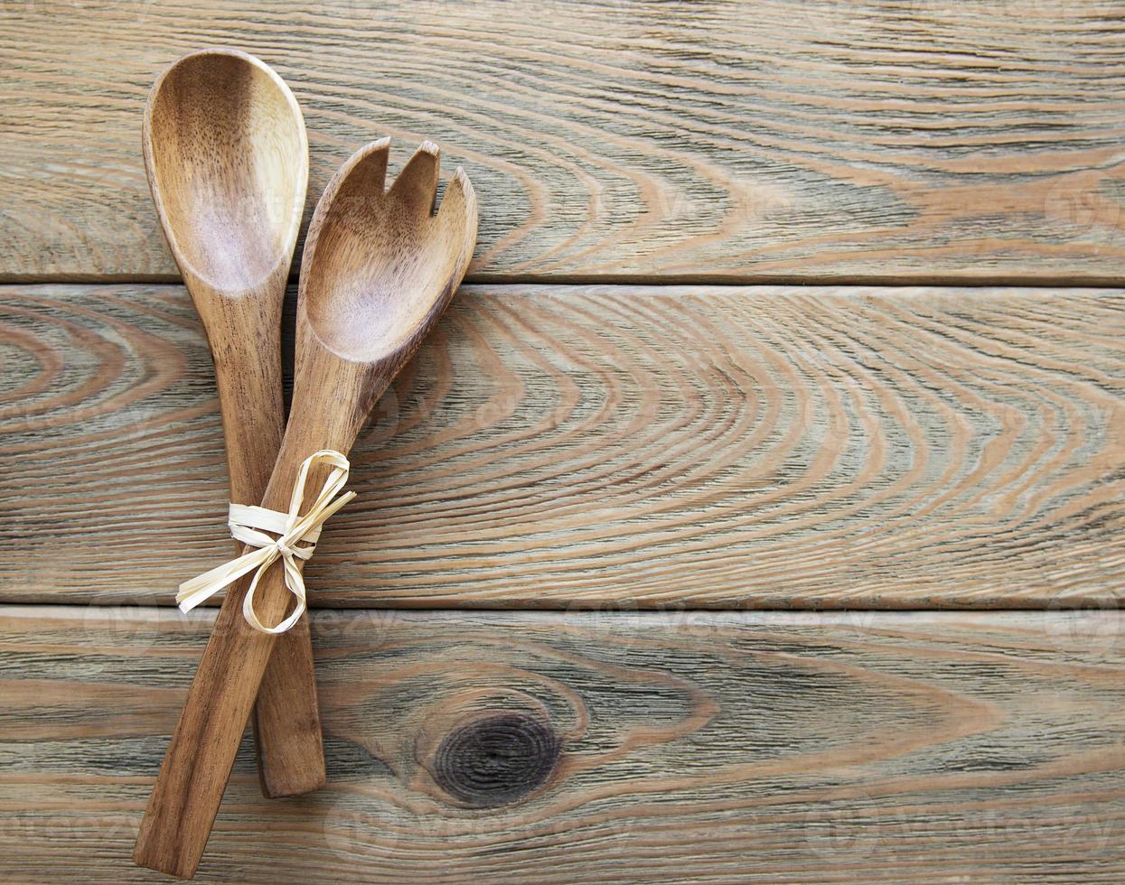 Two wooden salad spoons photo