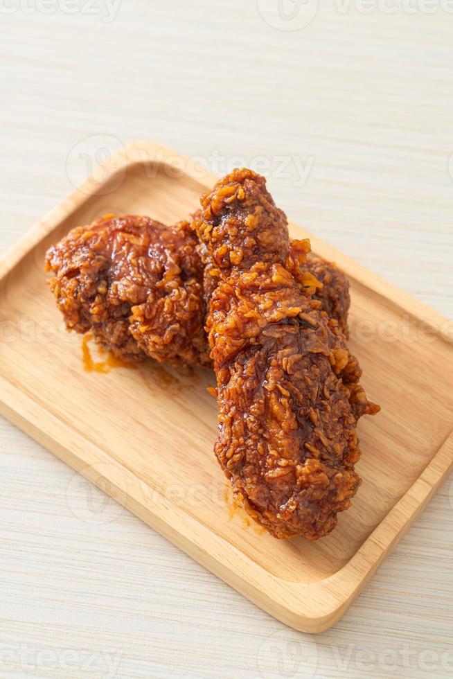 fried chicken with spicy Korean sauce photo