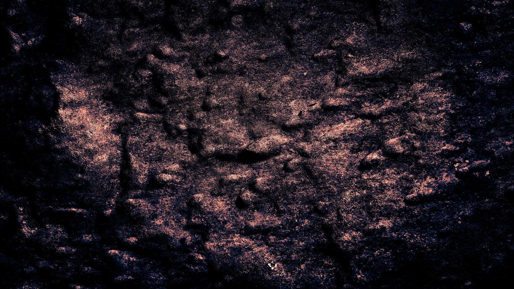 Fondo de textura oscura de hormigón de cemento viejo foto