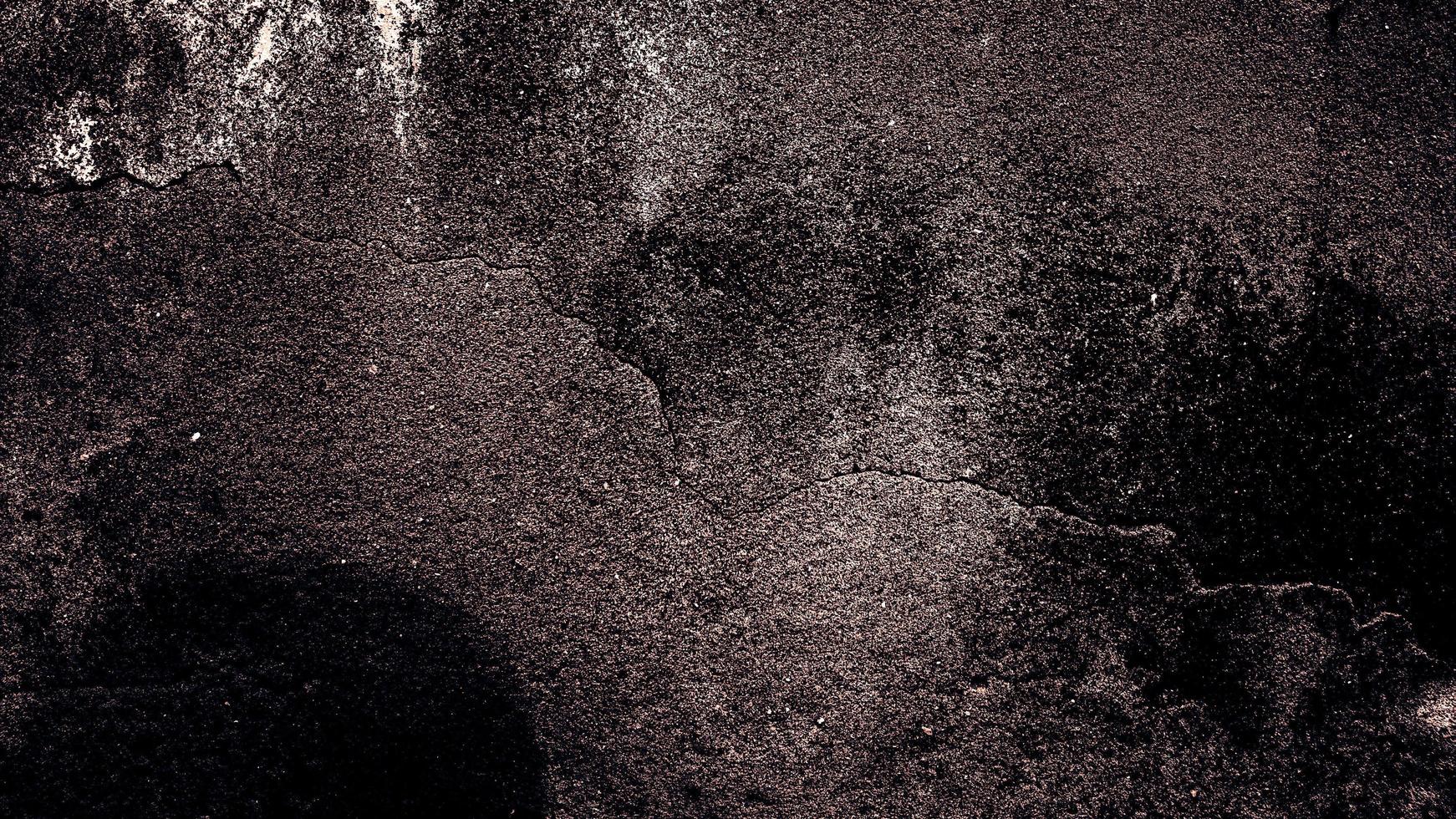 Fondo de textura oscura de hormigón de cemento viejo foto