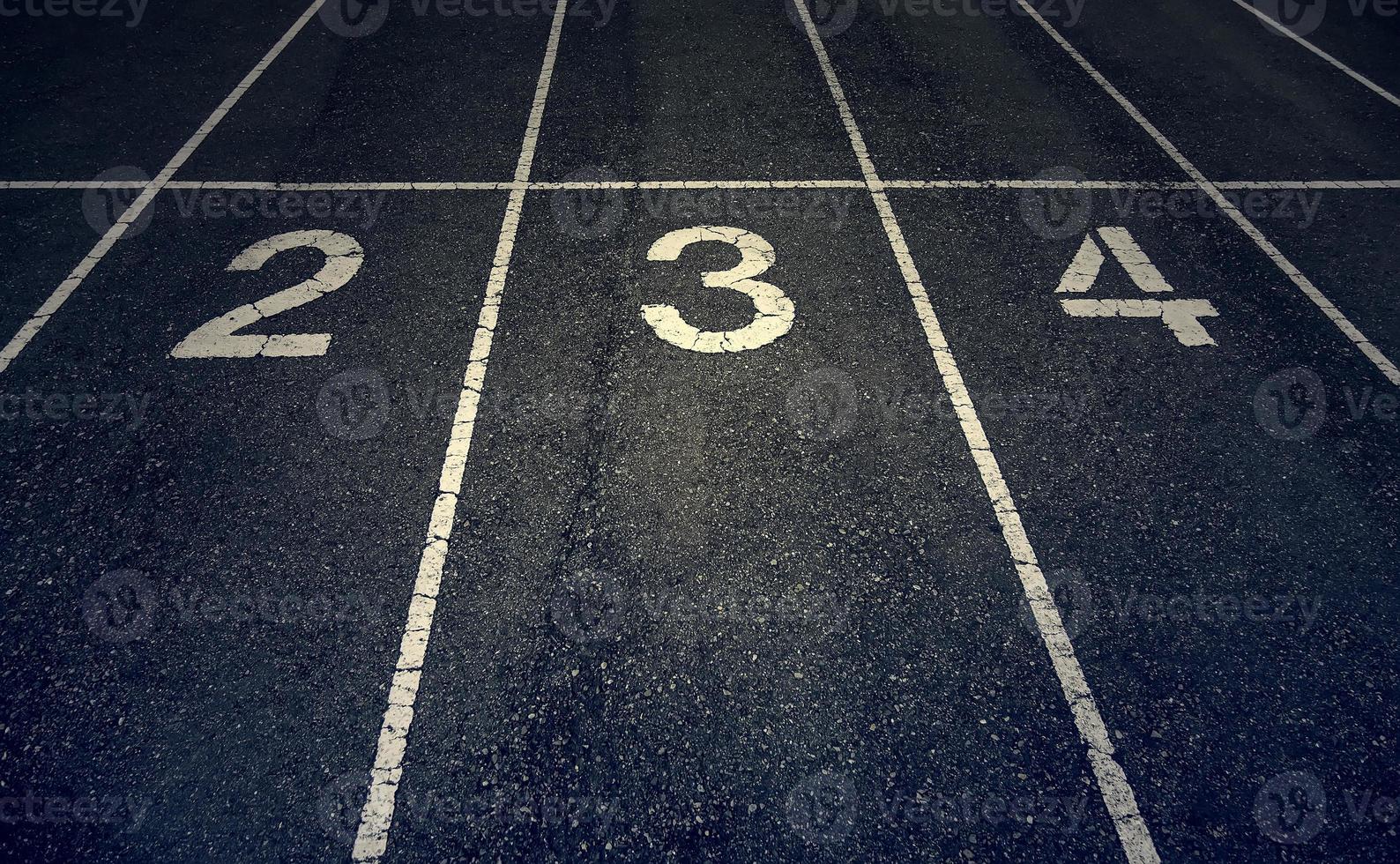 números en una pista de atletismo foto