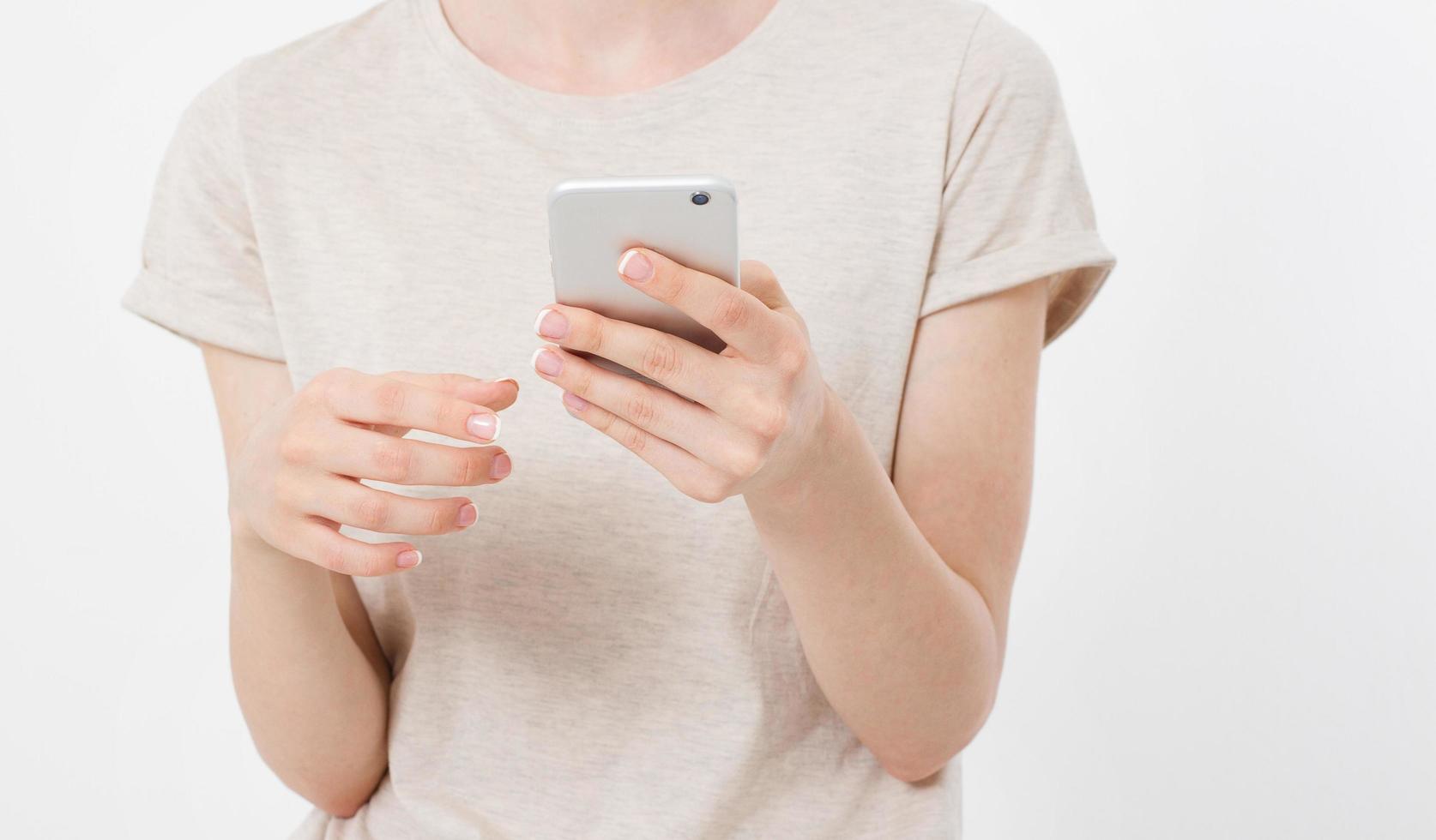 woman using mobile phone isolated on white background photo